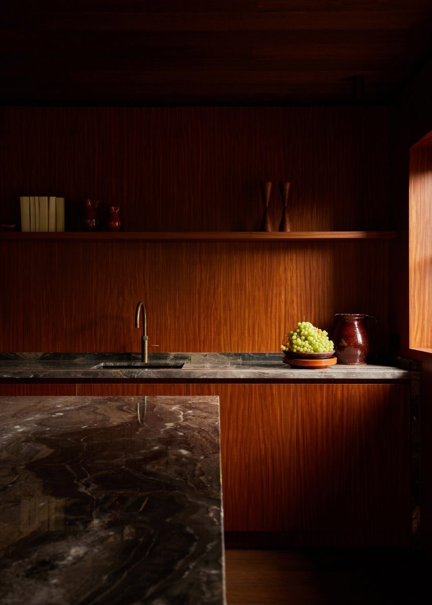 DAB Studio wood line kitchen with marble worktops