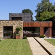 Elliott Architects arranges textural Hushh House around courtyards