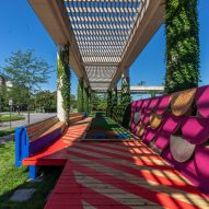 A colourful boardwalk installation with bright graphics