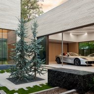 Greenway Parks Residence in Dallas features "auto lounge" for Ferraris
