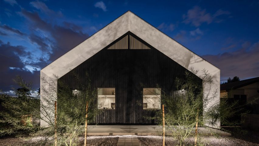 Gable end of a Phoenix house clad in black timber by SinHei Kwok