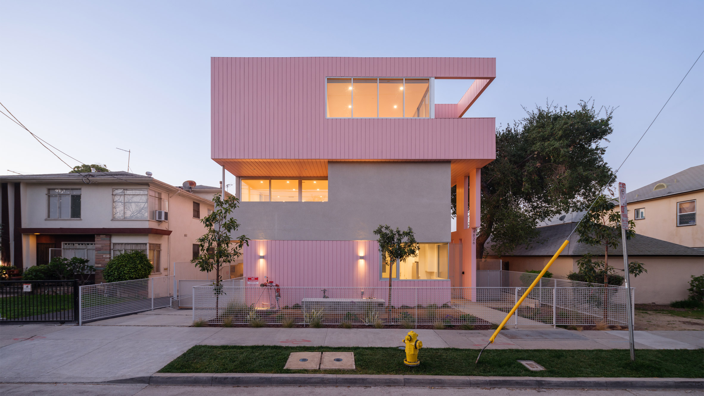 Yu2e draws on historic styles to create pink housing project in