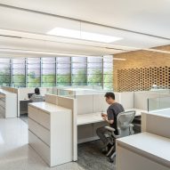 White open-plan office interior at Chicago Park District Headquarters by John Ronan Architects