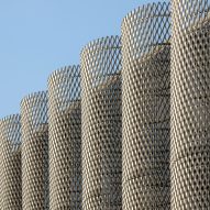 Rounded perforated aluminium screens on a building