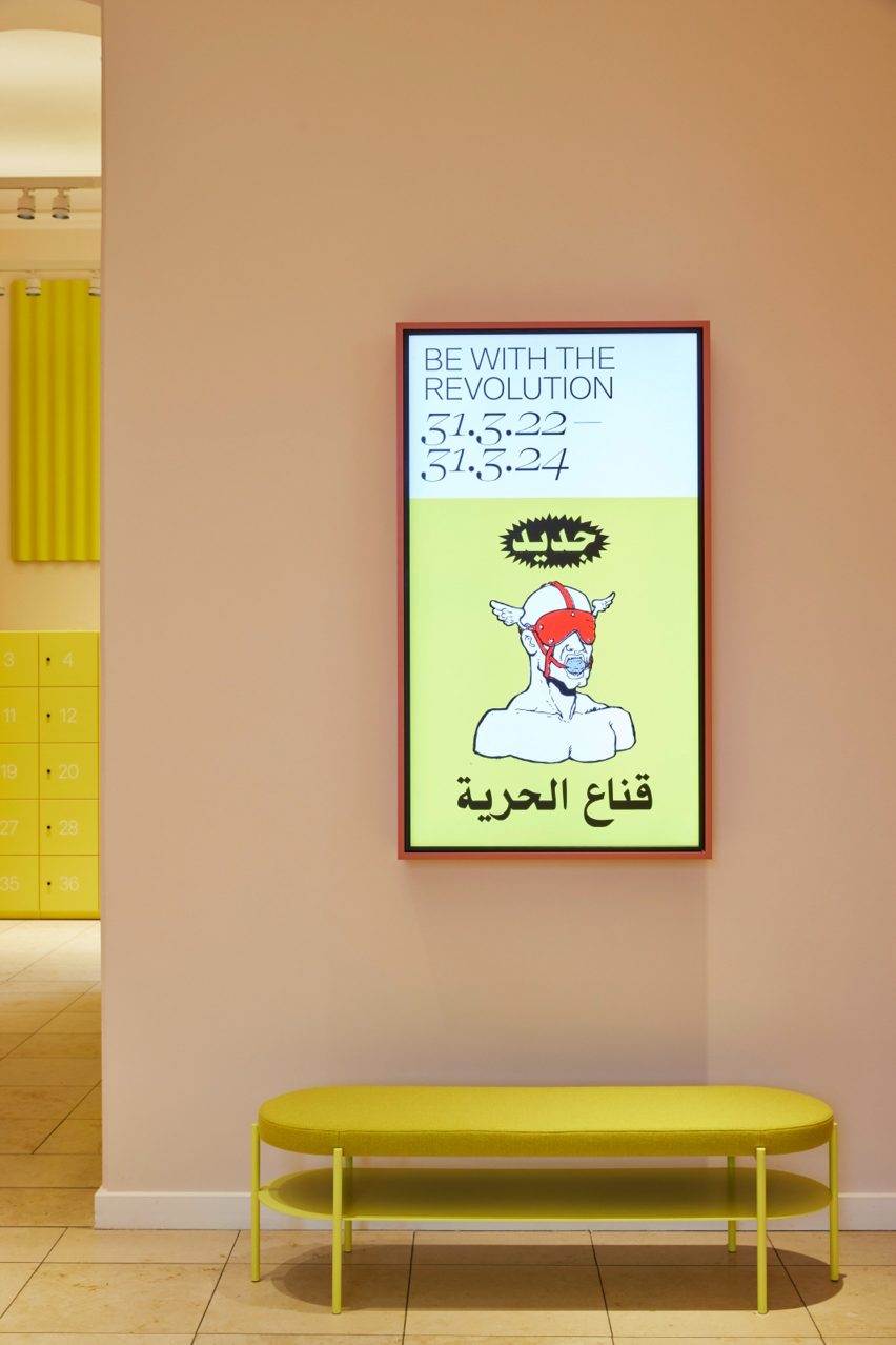 Bench and di،al display in foyer of MK&G museum