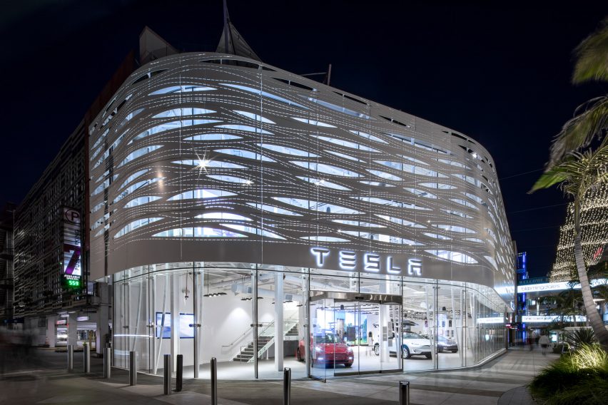 Tesla showroom with graphic perforated facade by NOWN