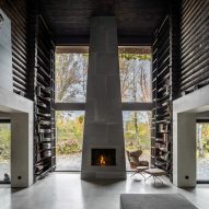 Relogged house by Balbek Bureau reinterprets traditional log cabins
