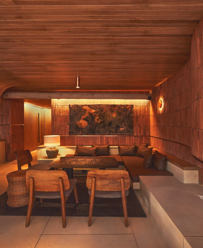 A restaurant with wooden walls and ceilings