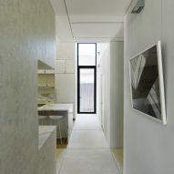 White marble kitchen interior and concrete footpath