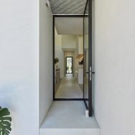 Concrete footpath leading through House 5 by The LADG