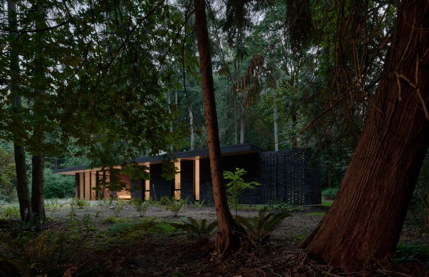 Exterior of The Rambler House in a forest by GO'C