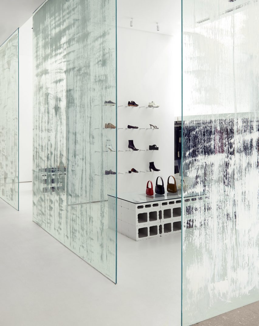 Glass panels partition different retail areas