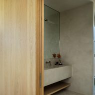 Bathroom with concrete walls and sink