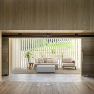 Timber interior with lounge chairs by a window