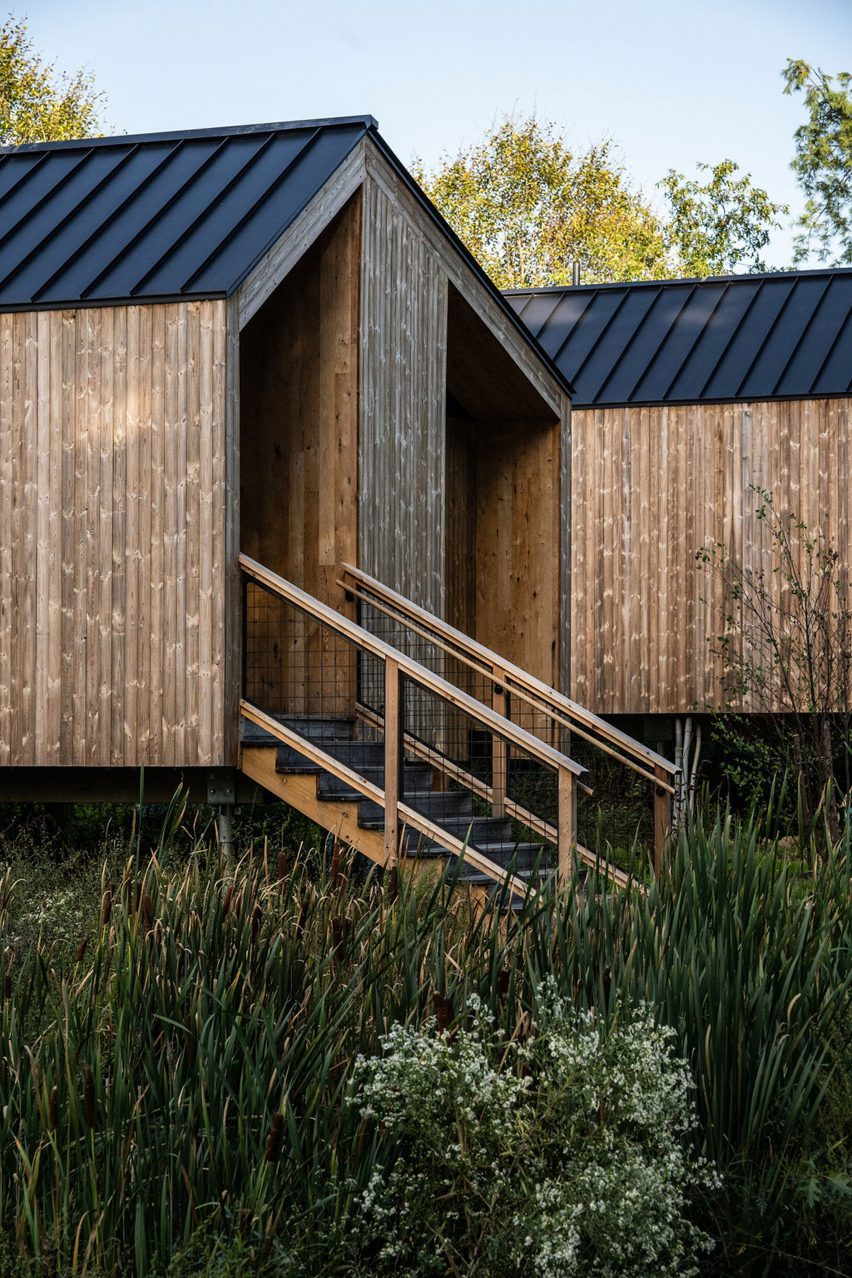 Cottages with reclaimed oak cladding and offset gabled roofs