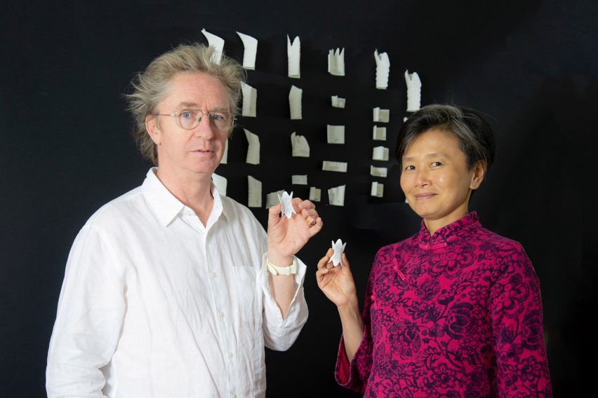 Anna Liu and Mike Tonkin ،lding up a medical device