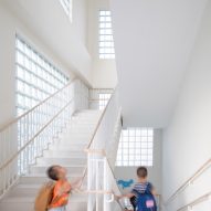 White staircase at the Kindergarten of Museum Forest by Atelier Apeiron