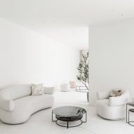White sofas in white room