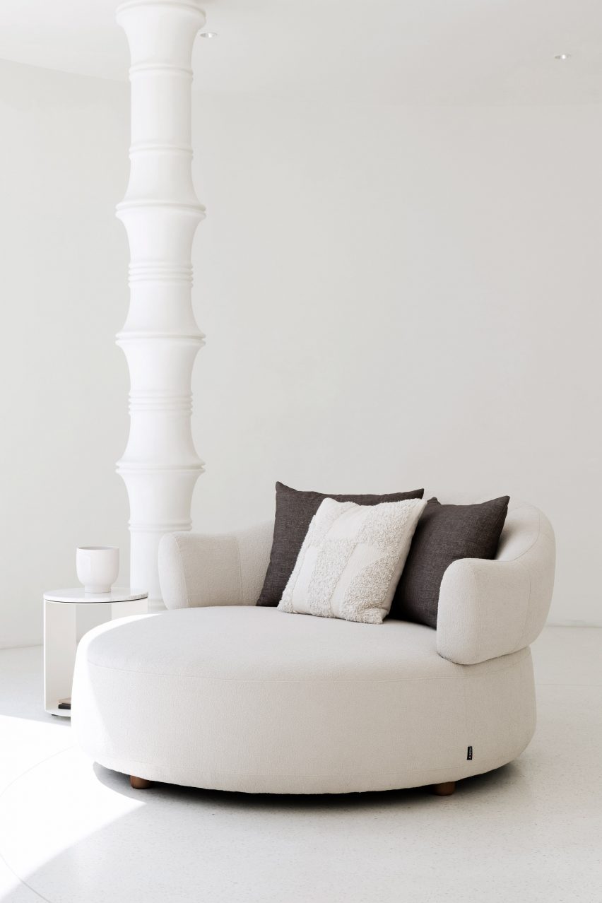 White armchair in white room