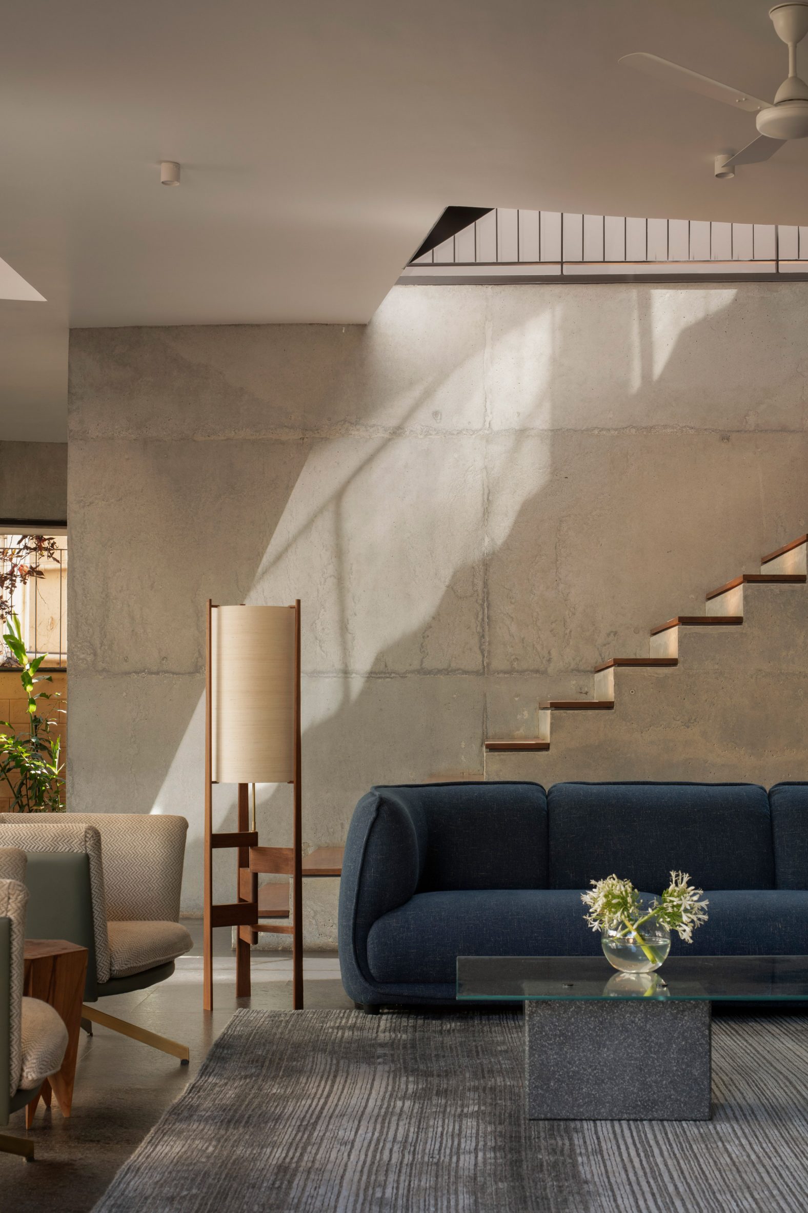 Living room with concrete backdrop