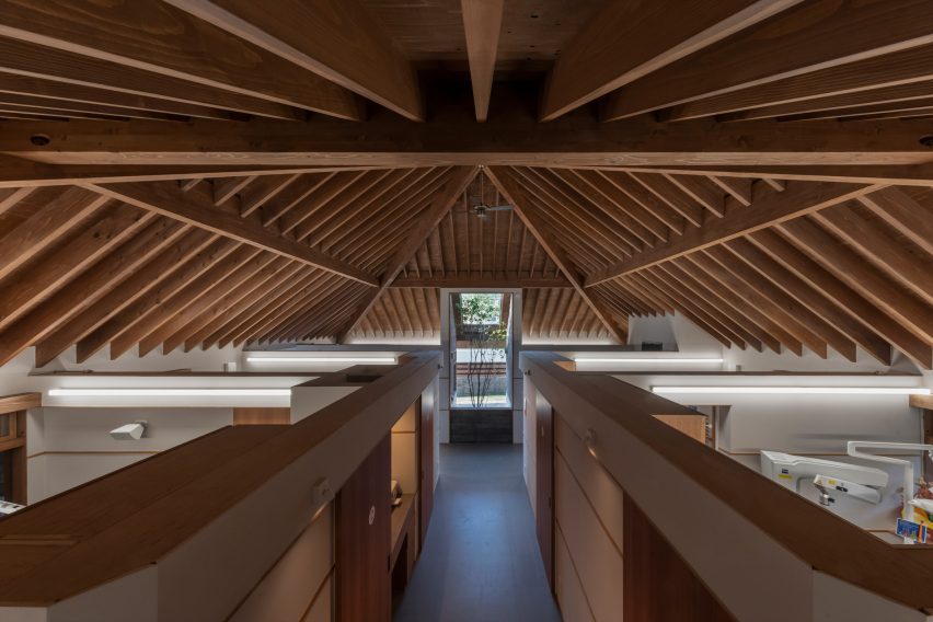 View over checkup rooms at Dentistry Coexisting with Nature by TSC Architects