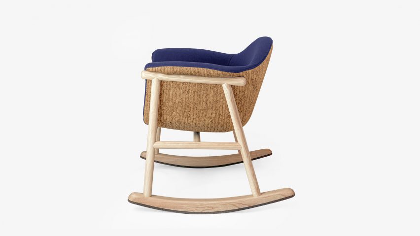 Blue-upholstered wooden rocking chair