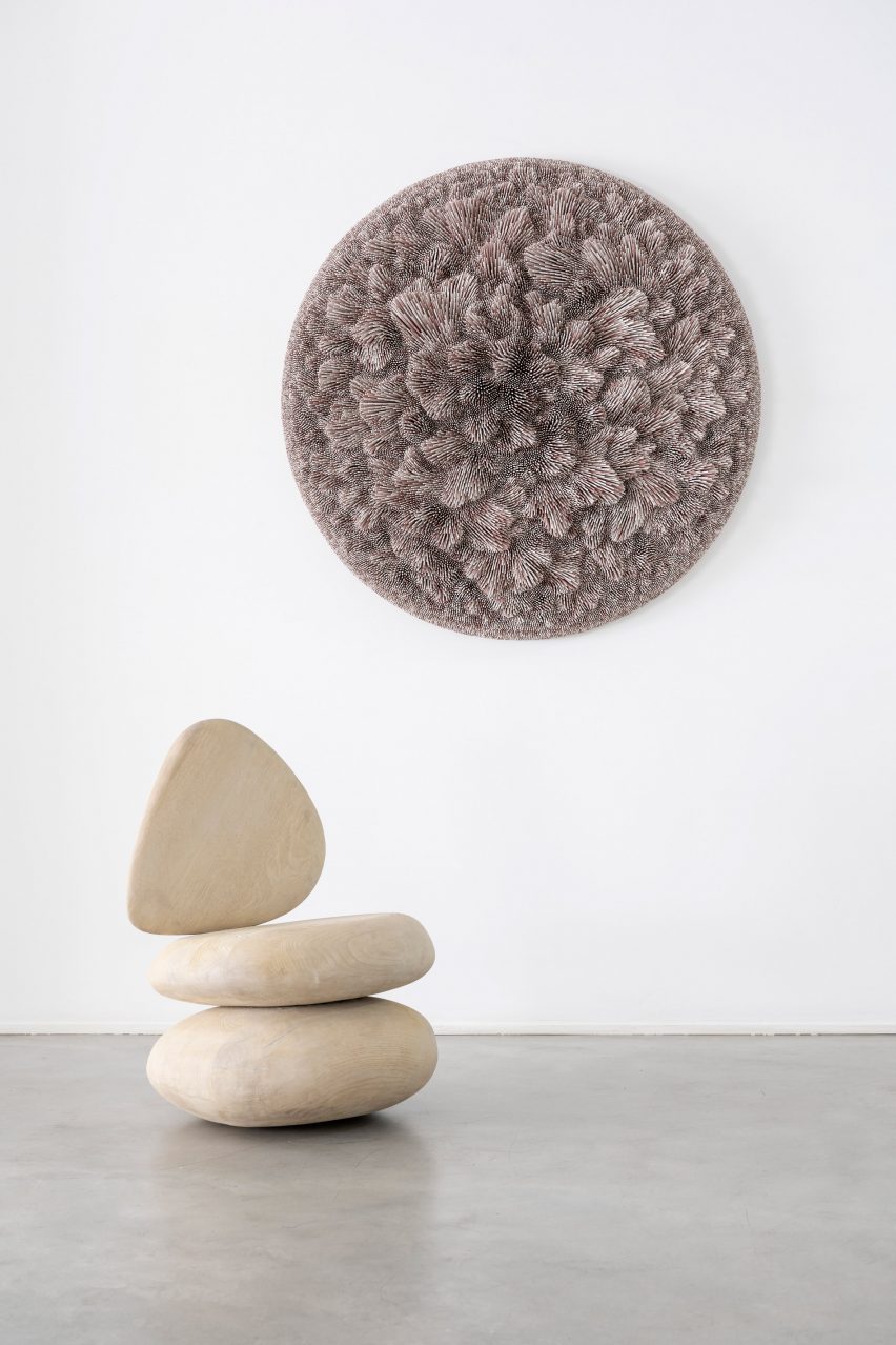 Wall art and stone chair at the Growth and Form exhibition at Gallery Fumi
