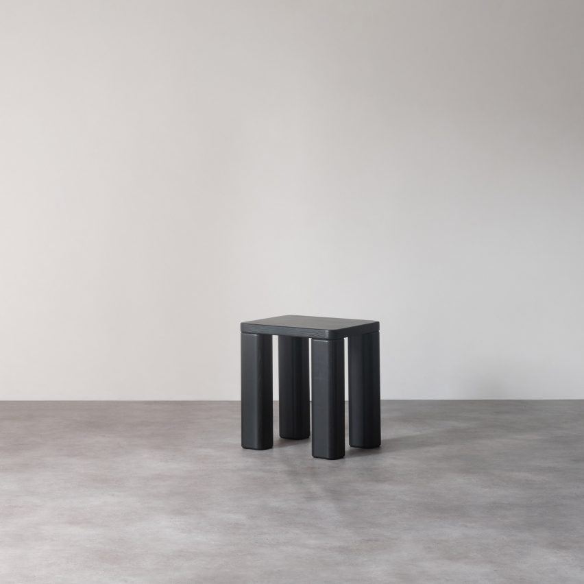 Black wooden stool by Goldfinger and the Tate Modern