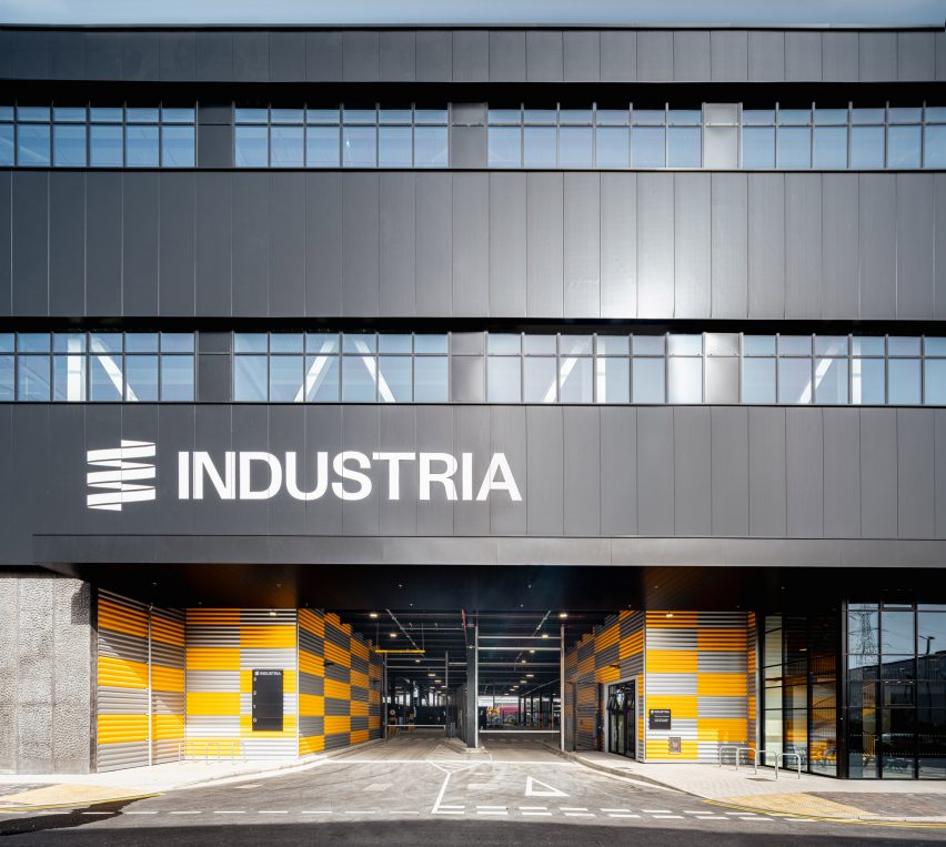 Entrance to Industria multi-storey industrial building with black metal cladding