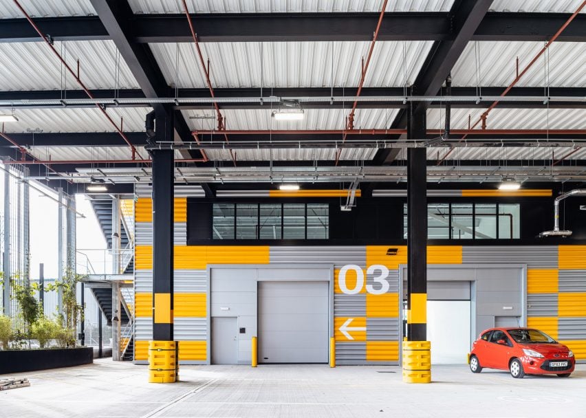 Car parking deck on a multi-storey industrial building by Haworth Tompkins