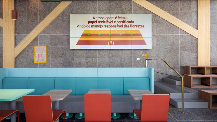 Interior seating at the mass timber McDonald's in Sao Paulo by Superlimao