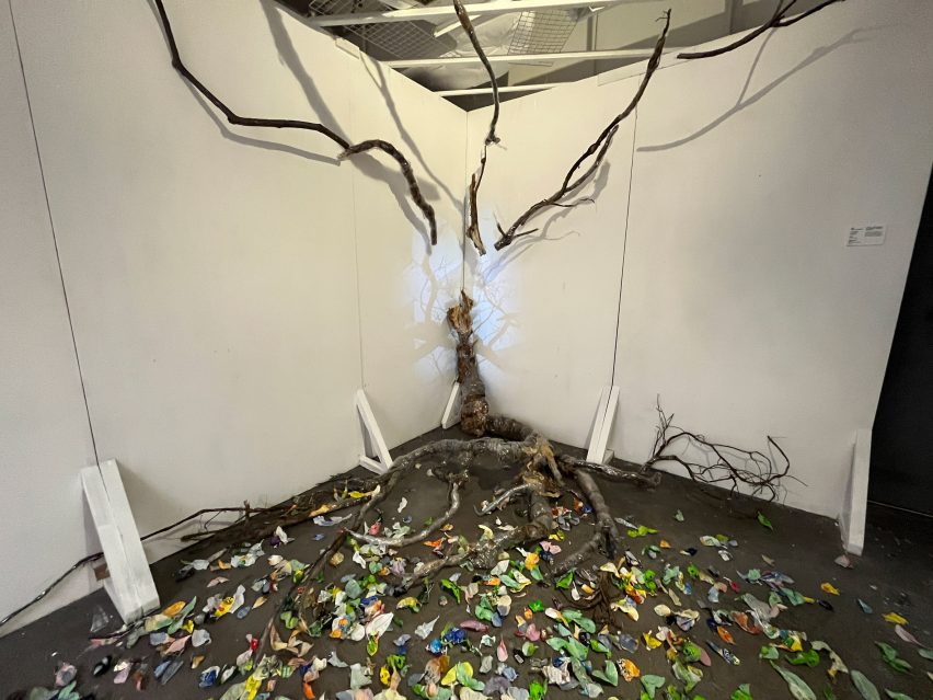Installation showing tree in corner of room