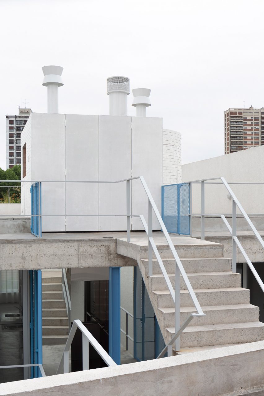 Rooftop of a concrete apartment building by Juan Campanini and Josfina Sposito