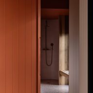 Walk-in shower with terracotta timber walls