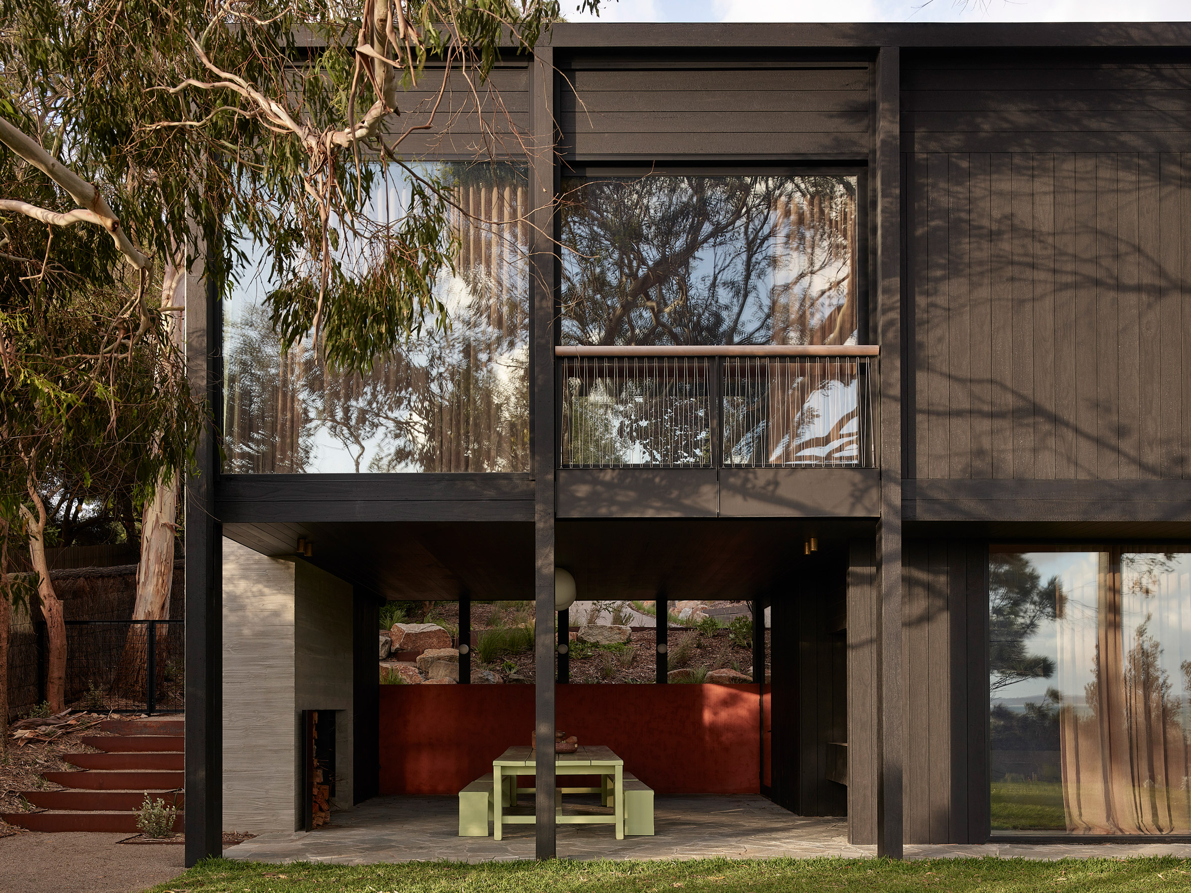 Blackened wood exterior of Somers House by Kennedy Nolan