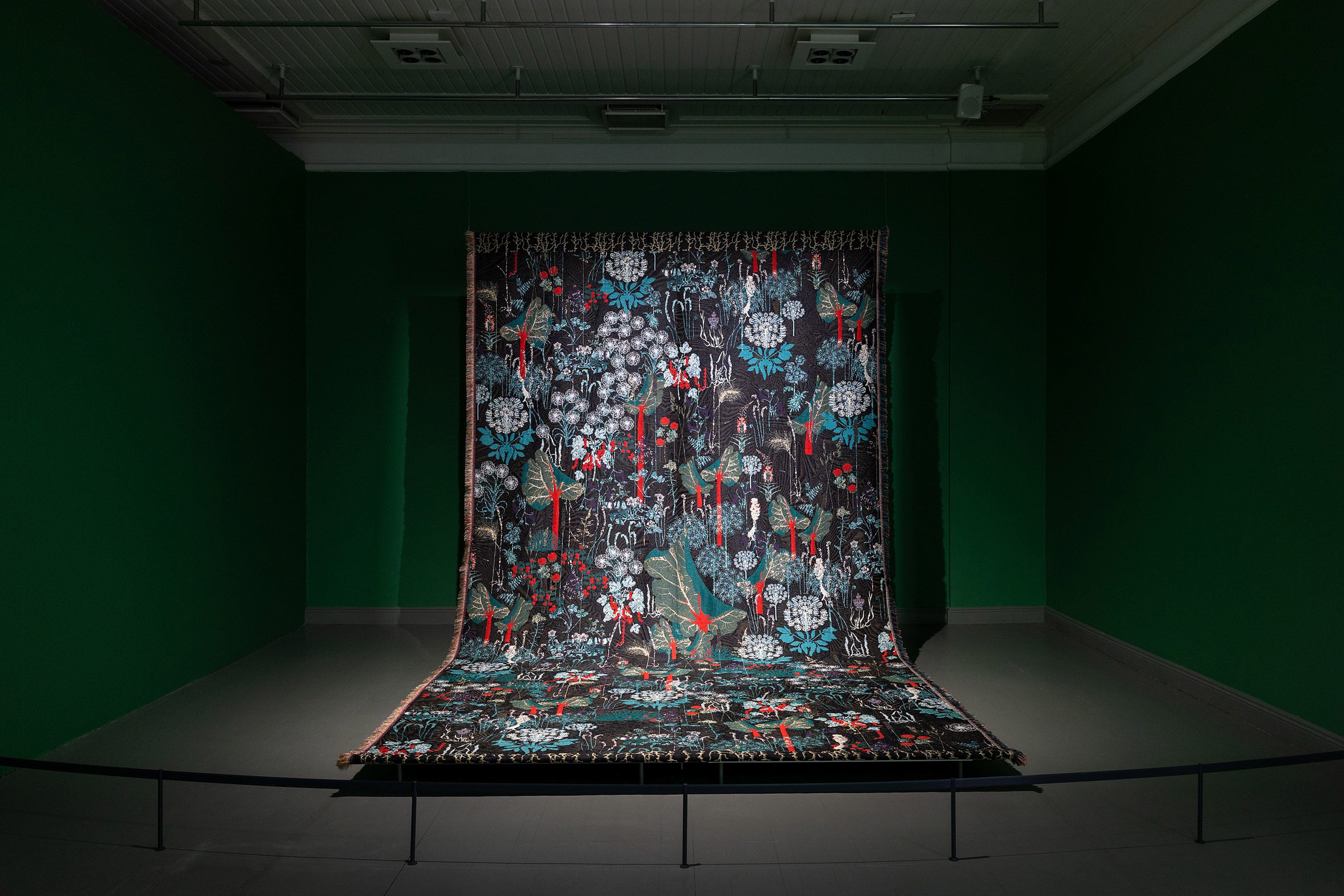 Dramatically lit tapestry at Helsinki Design Museum