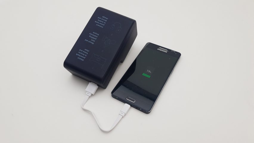 Portable charger hooked up to a phone