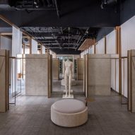Neri&Hu divides Shanghai fashion boutique with fabrics and marble screens