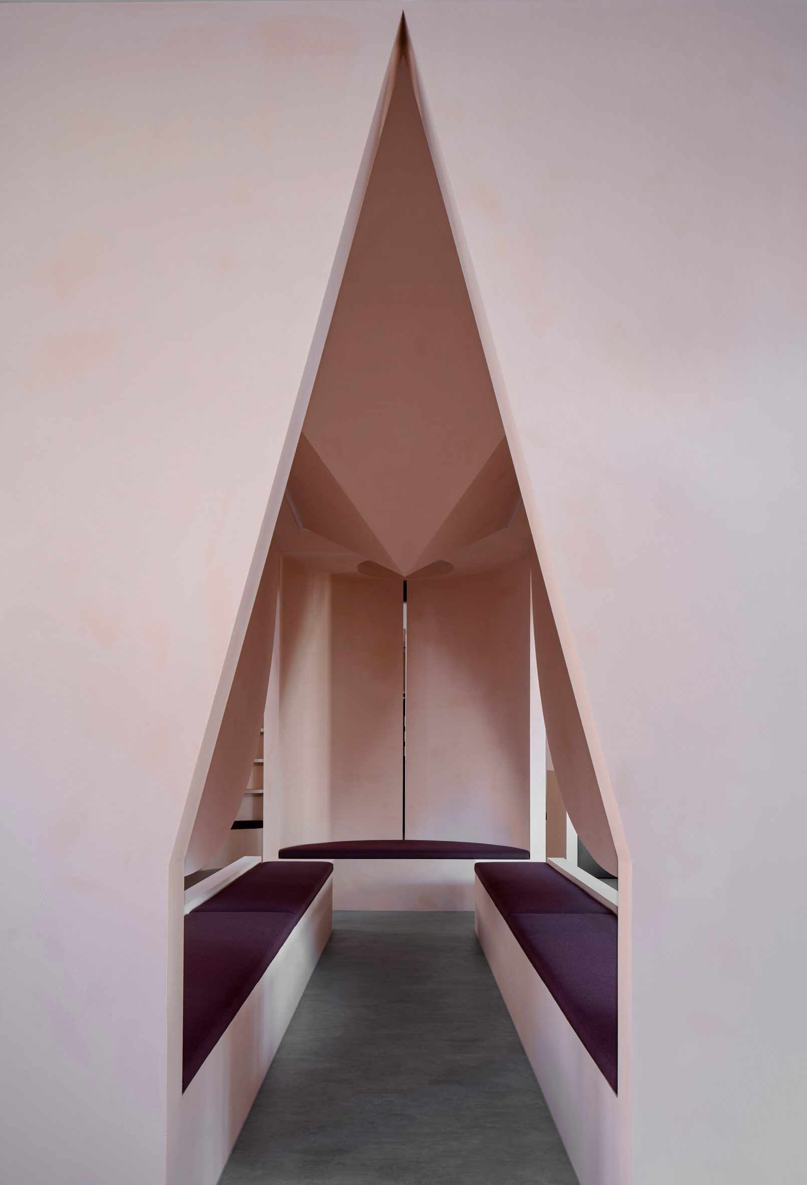 A pointed arch opening into a space for reflection