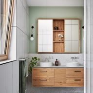 White-tiled bathroom with a wooden floating vanity unit