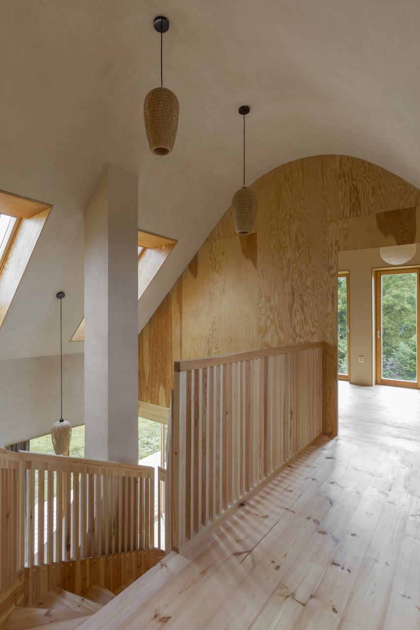 Pine-lined first floor of Czech house by Studio Circle Growth