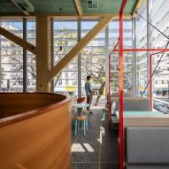 Interior of the mass timber McDonald's in Sao Paulo by Superliamo