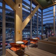 Mass timber columns and seating at the McDonald's in Sao Paulo