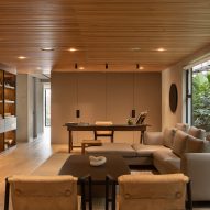 Open plan living room with timber finishes