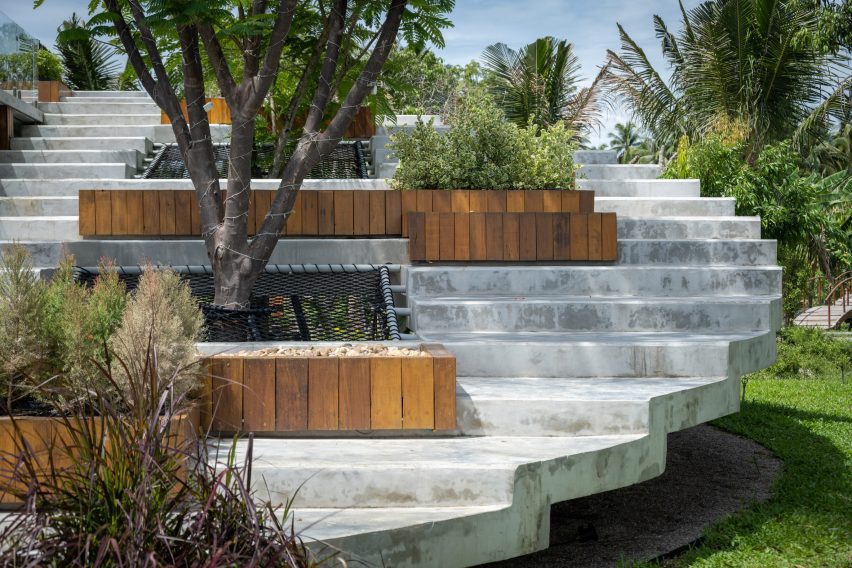 Stepped concrete landscape with wooden planters