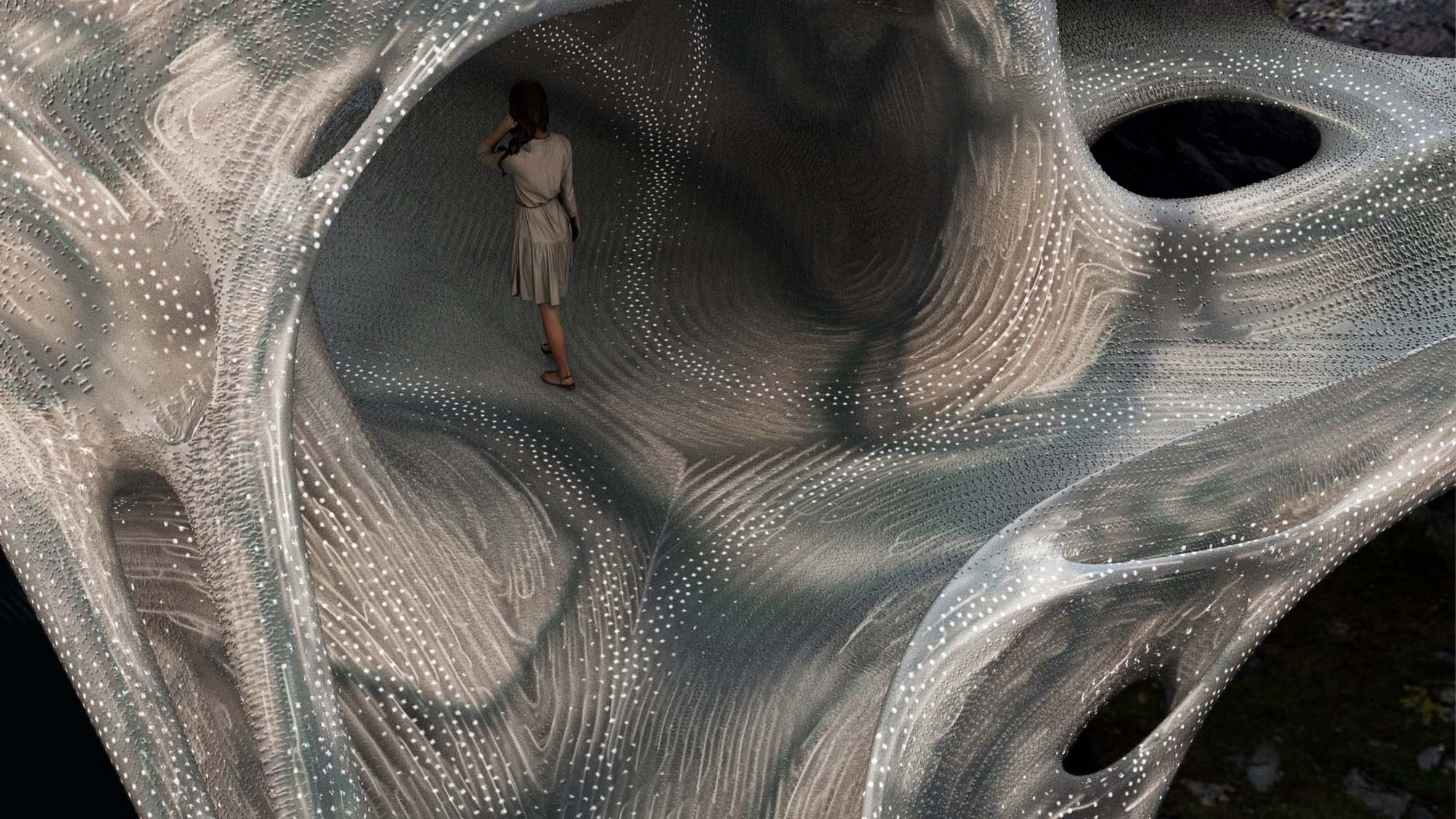 Softbiome's digital visual of a female standing in a cave of an organic shape