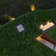 Top view of the grassy roof at The Under The Ground House by WillemsenU
