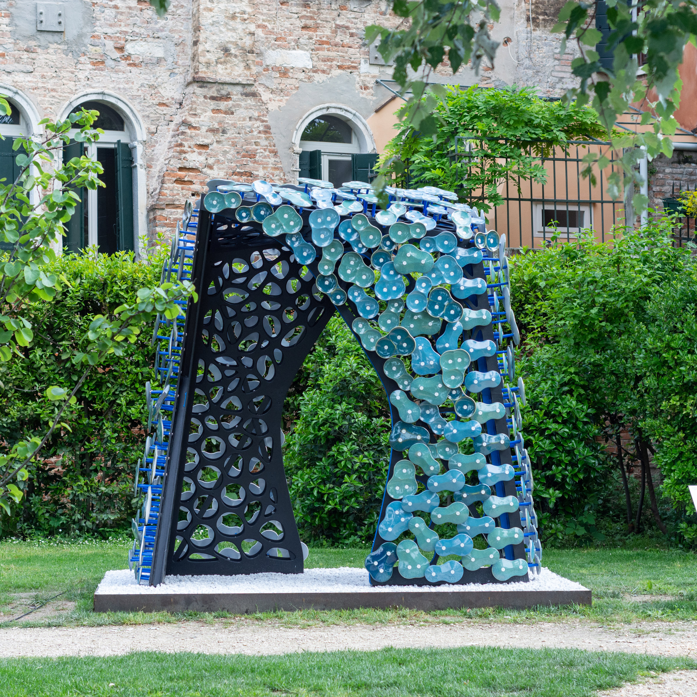 Architectural sculpture made from blue-coloured metal pieces