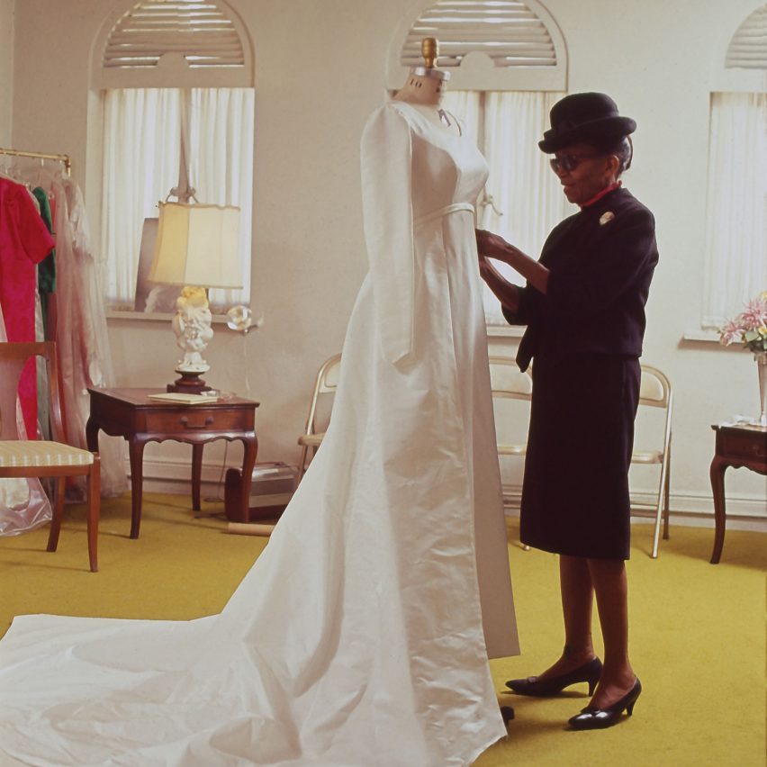 Fashion designer Ann Lowe fitting a dress