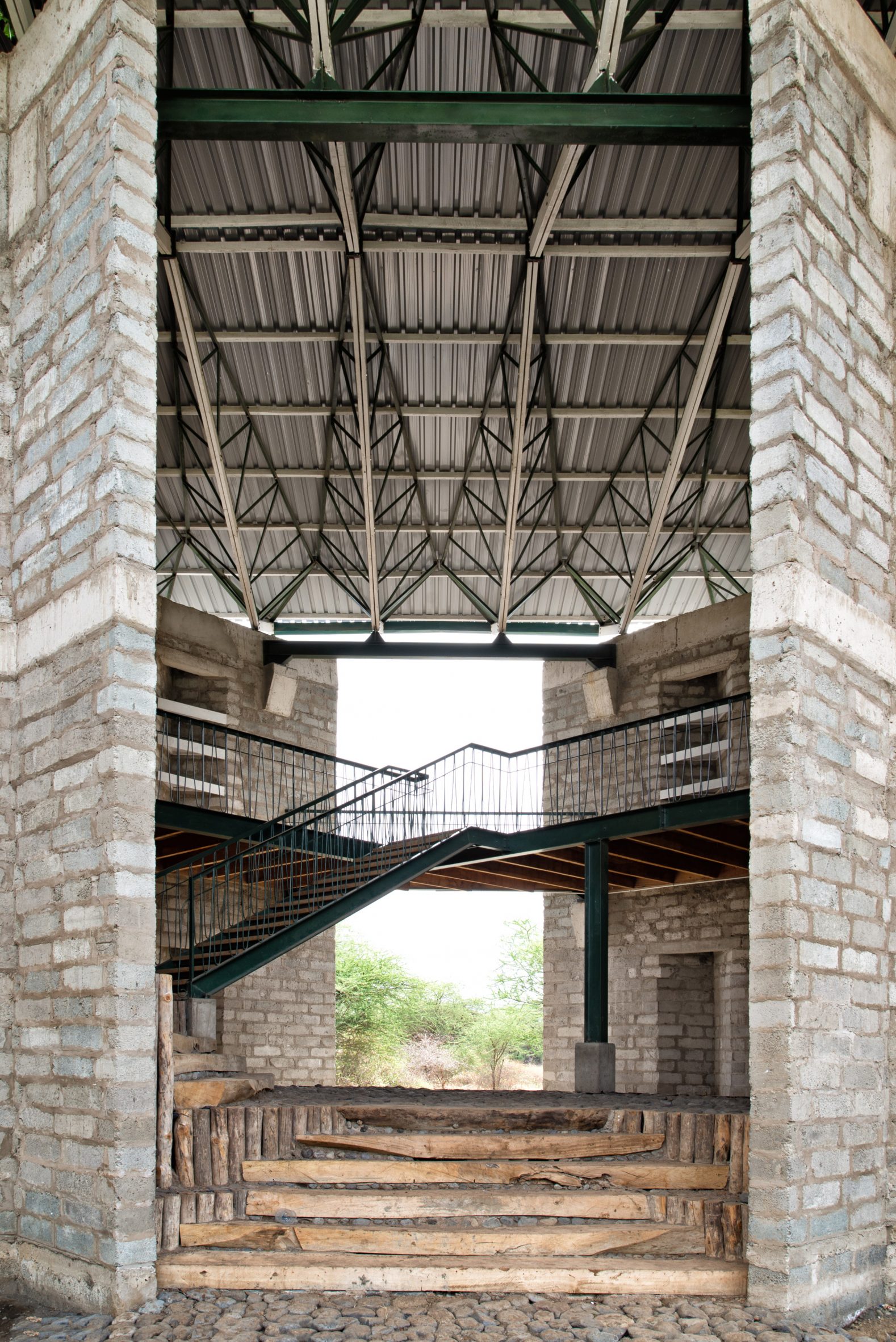Metal staircase at the Simba Vision Montessori School in Tanzania by Architectural Pioneering Consultants